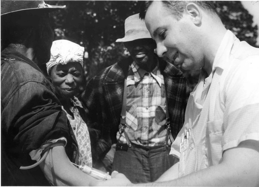 1200px Tuskegee syphilis study doctor injecting subject