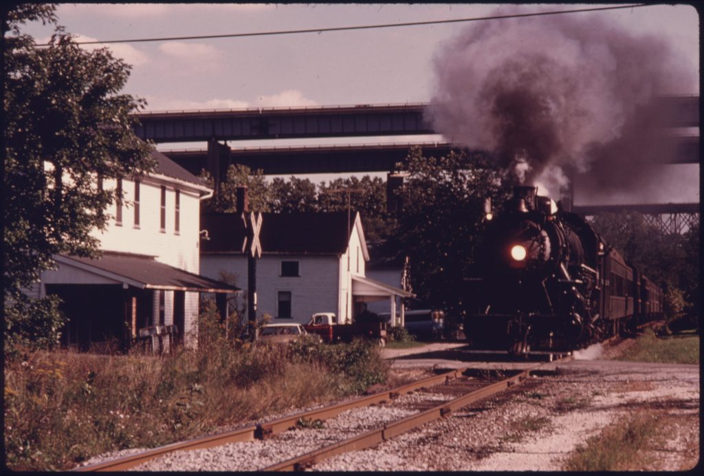 BOSTON MILLS ROAD AT BOSTON MILLS OHIO NEAR CLEVELAND IS SEEN BY PASSENGERS OF THE WEEKEND CUYAHOGA VALLEY LINE... NARA 557965