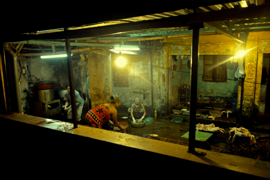 Slaughterhouse by night by International Livestock Research Institute Slaughterhouse Worker fotografia