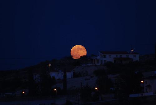 August Full Moon Rising by George M. Groutas moon illusion photo