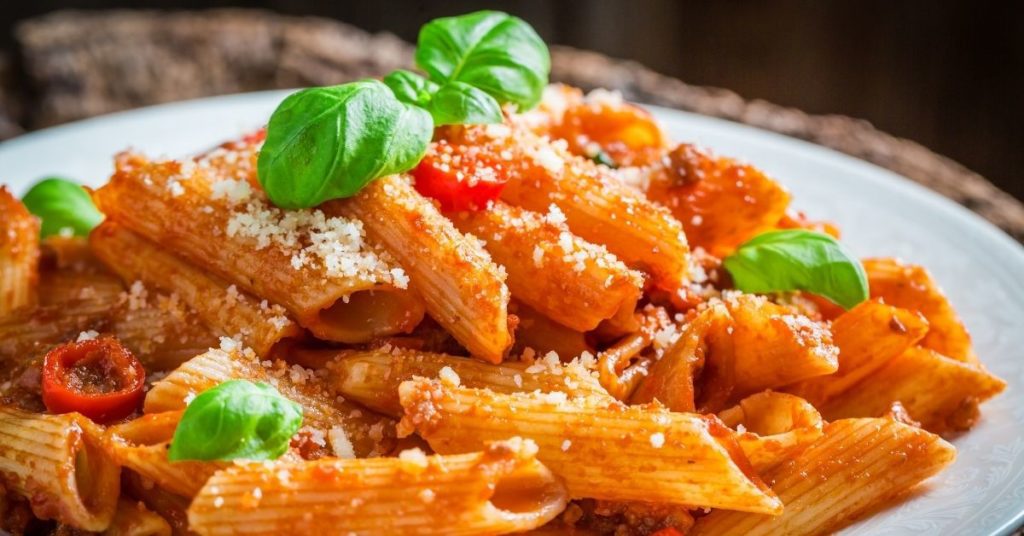 Spaghetti Bolognese with Basil in a Plate 1024x536 1