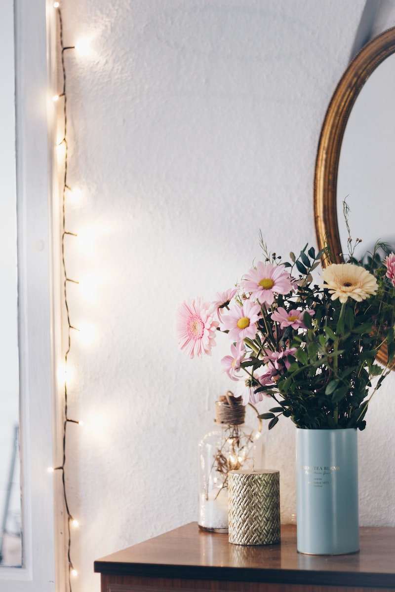 Pink and Yellow Flowers in Blue Vase
