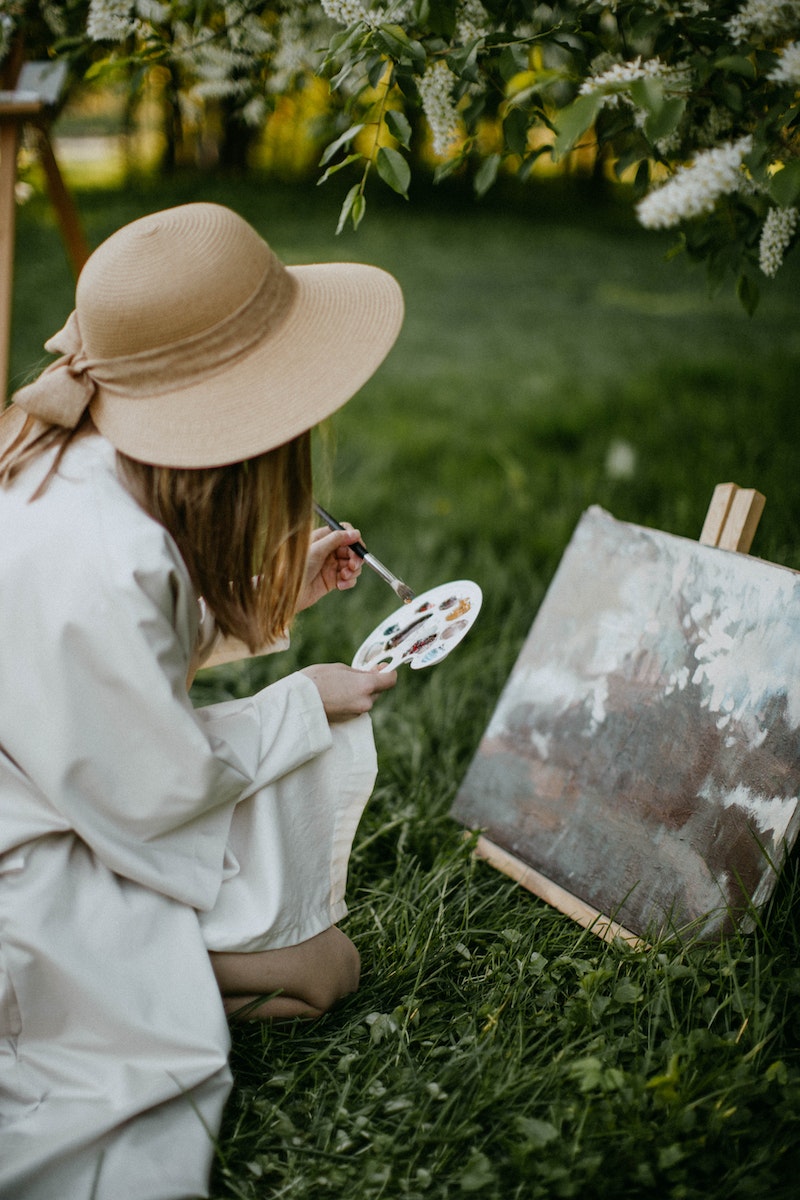 Woman Painting Outdoors