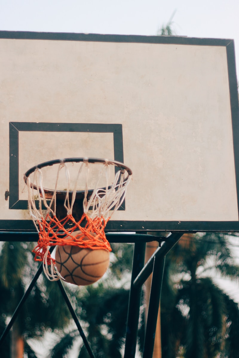 close-up photo of basketball rim during daytime