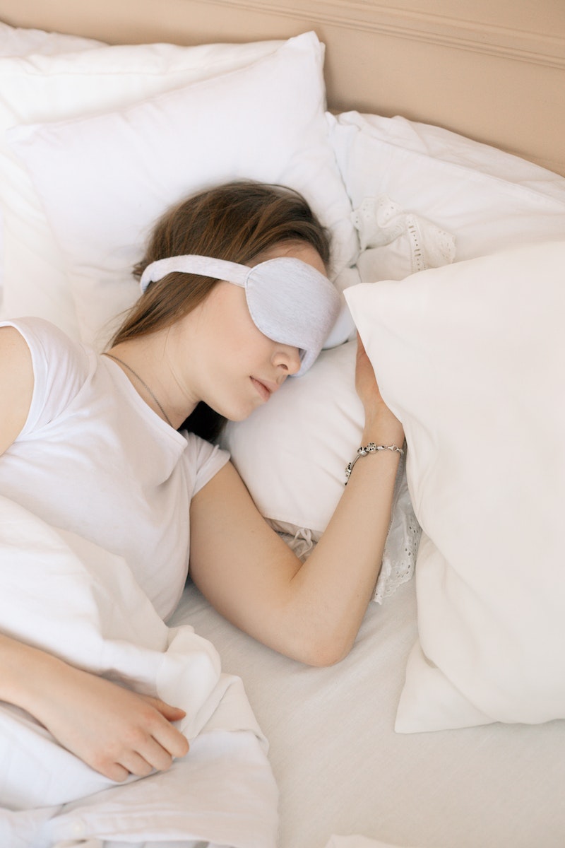 A Woman Sleeping with a Sleep Mask