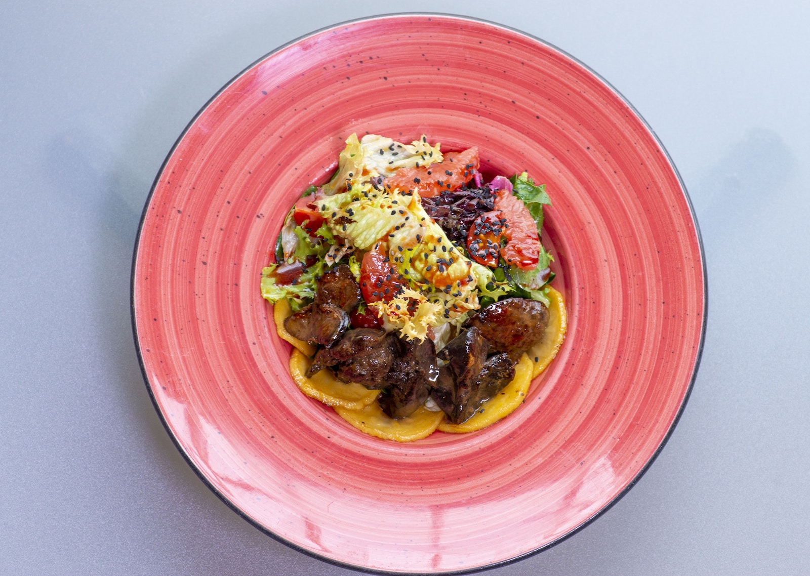 Appetizing Lunch Meal of Cooked Poultry Liver and Vegetable Salad
