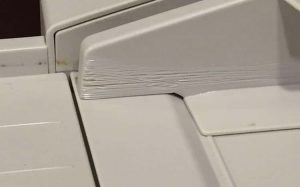 a fax machine s paper cuts photo u1