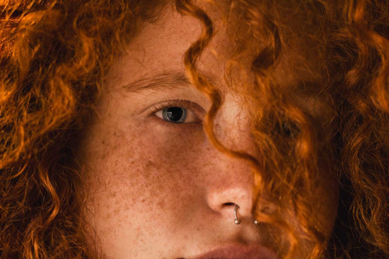 Close-Up Photo Of Person With Nose Ring