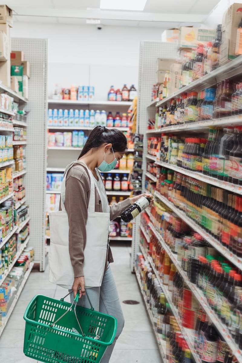 Woman Shopping Inside a Supermarket