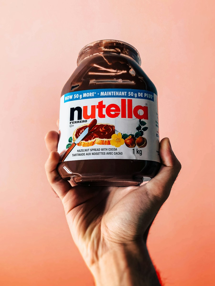 person holding Nutella jar