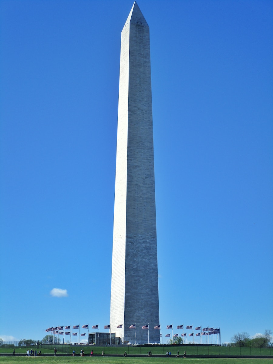 gray concrete tower under blue sky during daytime