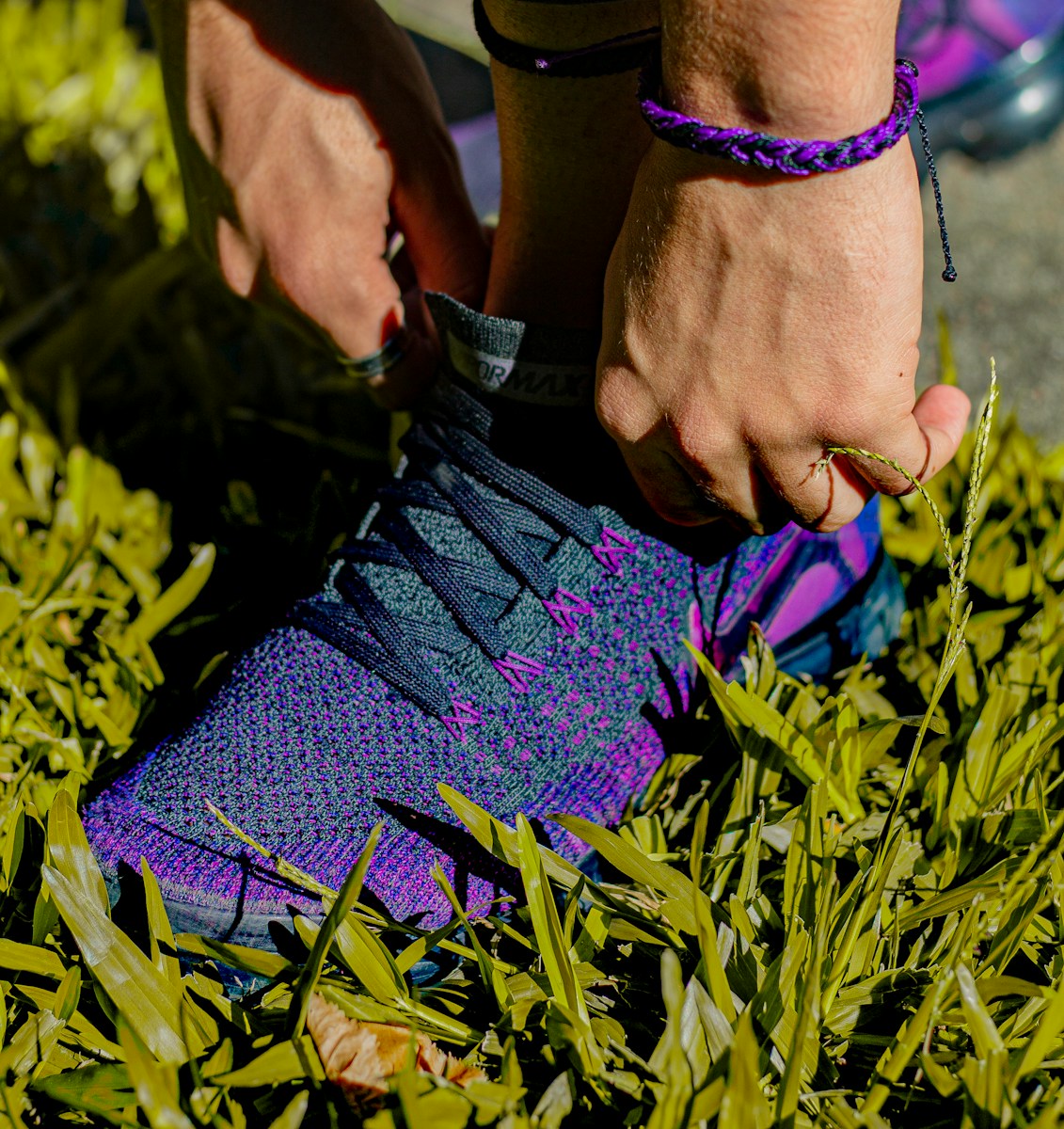 purple Nike athletic shoes