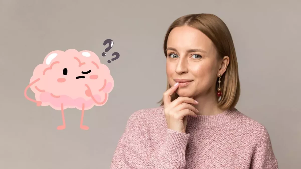 Žena v ružovom svetri premýšľa s kresleným mozgom vedľa nej, otázky symbolizujú zamyslenie.
