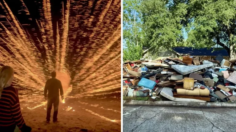 Osoba pred ohňostrojom a hromada odpadu pred domom pod stromami.