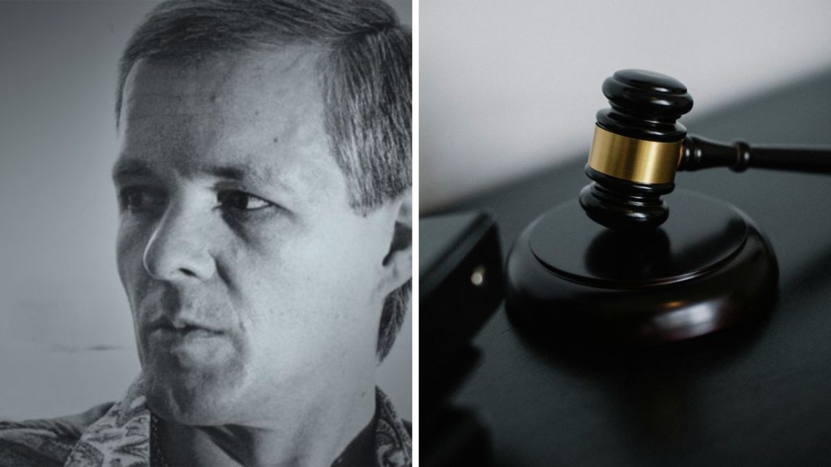 Portrét muža vedľa sudcovského kladiva na stole, symbolizujúci spravodlivosť.