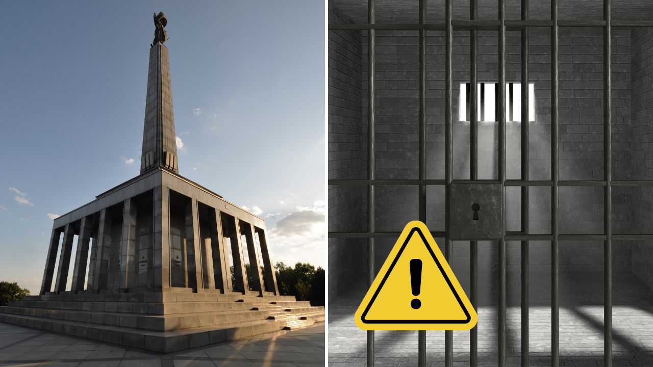 Pamätník a väzenská cela s výstražným symbolom.