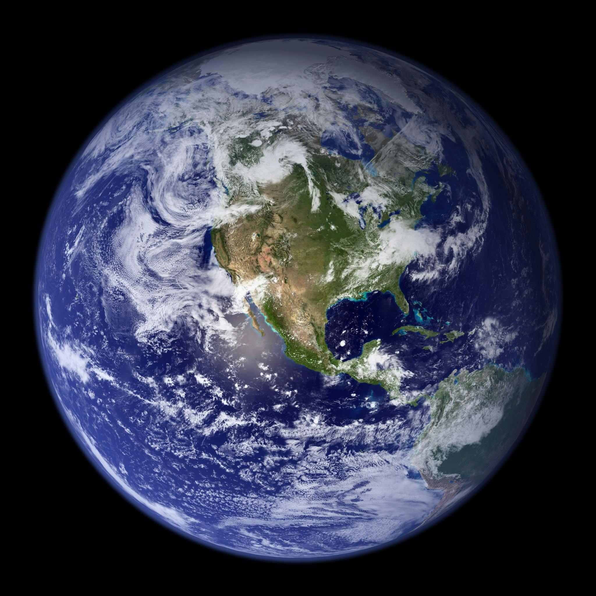 Planéta Zem z vesmíru. Pohľad na Severnú Ameriku, oceány a oblaky. Astronomická fotografia planéty.