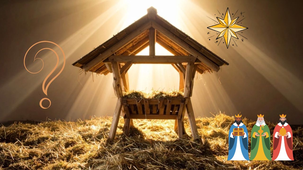 Prázdne jasličky v maštali osvetlené svetlom s tromi kráľmi a hviezdou na Vianoce.